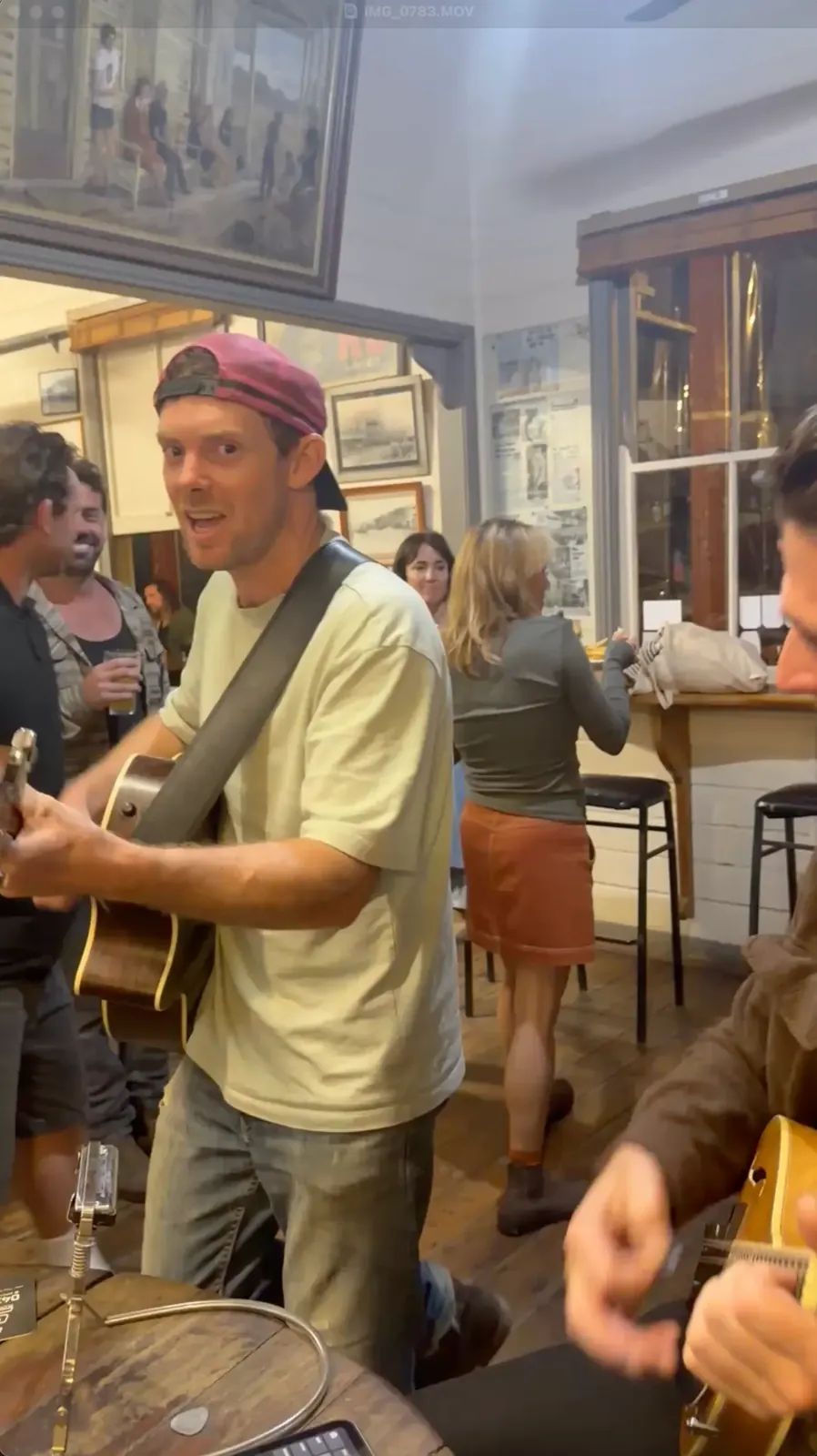 Keiren playing guitar at the Middle Pub session